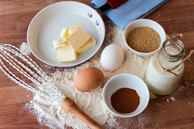 cake-preparation-butter-milk-eggs-sugar-laid-on-a-table